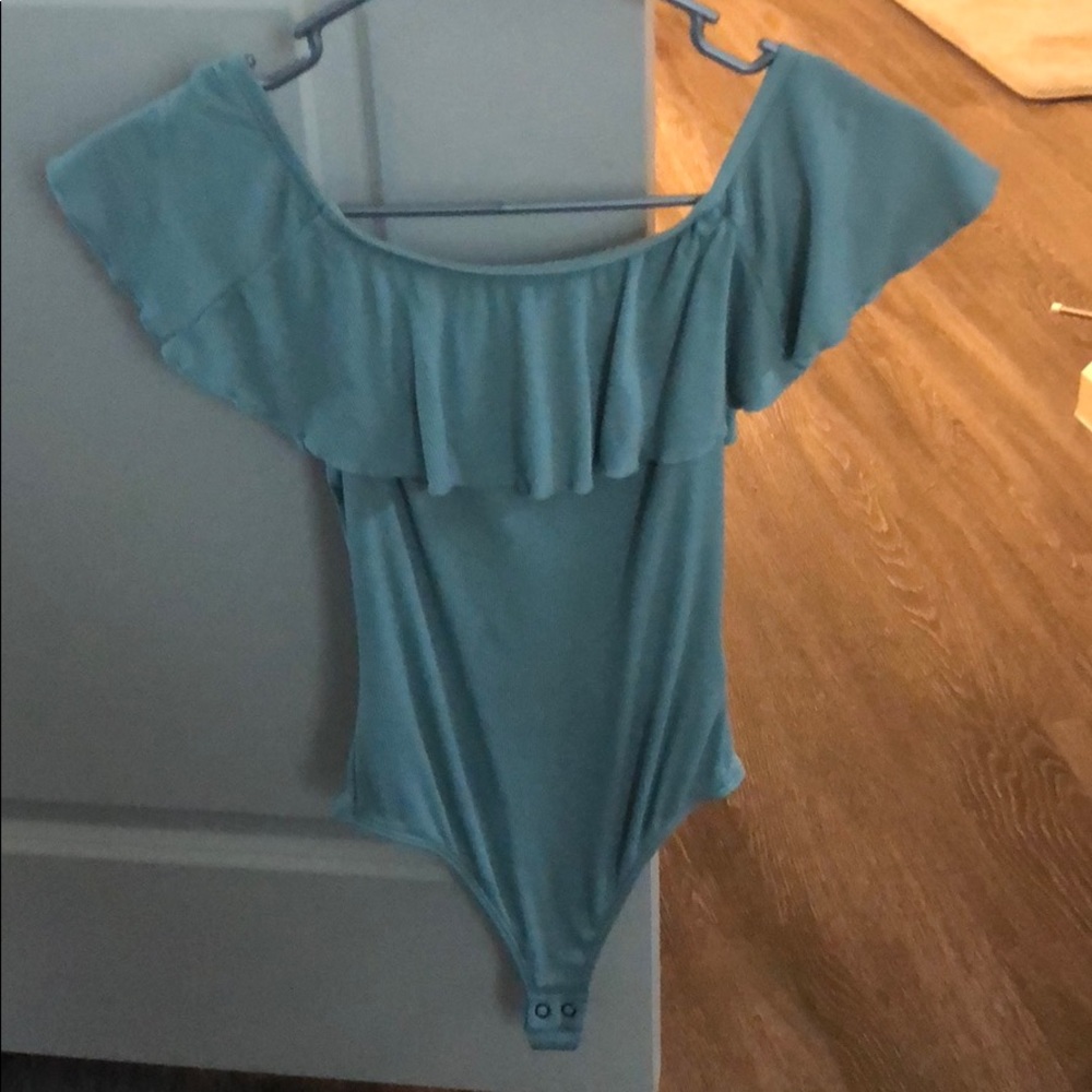 Off the shoulder body suit.